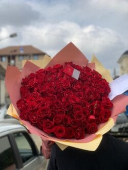 A luxurious bouquet of 100 VIP red roses elegantly arranged in premium packaging. What different blooms symbolize for Mother’s Day 5 romantic flower & cake combos for a Lagos anniversary dinner