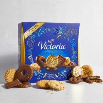 A box of McVitie's Victoria Biscuits, featuring an assortment of chocolate-covered treats, ideal as a gift for her