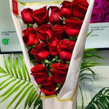 tanding bouquet of fresh red roses for birthdays, anniversaries, and Valentine’s Day in Lagos.